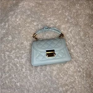 Baby blue and gold mini bag